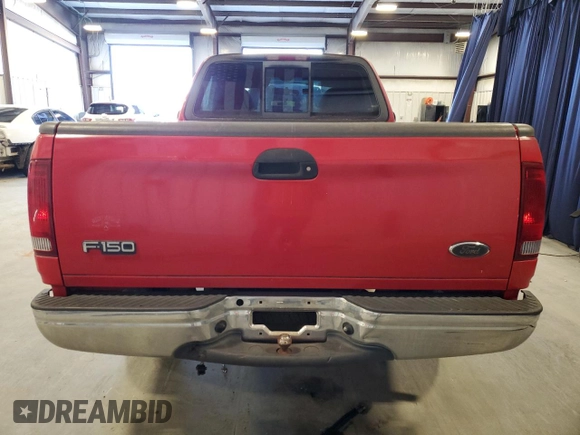 2003 Ford F-150 XL with VIN 1FTRF17W03NB26338, listed as a Copart auction lot 82484904 with 163,992 mi miles and Salvage Title. Bid and sale history available at DreamBid. Image 6.