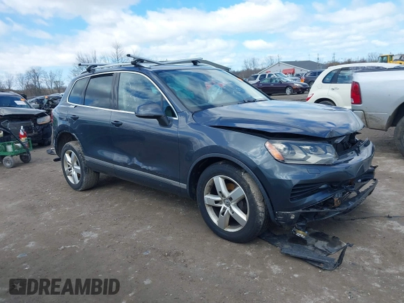 2013 Volkswagen Touareg Lux with VIN WVGEF9BP4DD006851, listed as a IAAI auction lot 41983791 with 115,551 mi miles and . Bid and sale history available at DreamBid. Image 12.