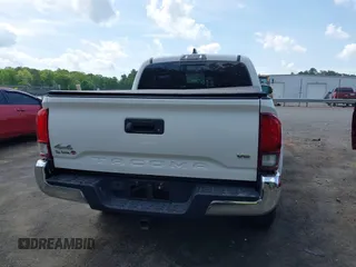 2021 Toyota Tacoma SR z VIN 5TFCZ5AN5MX265181, wystawiony jako IAAI lot #42077902 z przebiegiem 102 192 mil mil oraz . Historia ofert i sprzedaży dostępna na DreamBid. Obrazek 16.