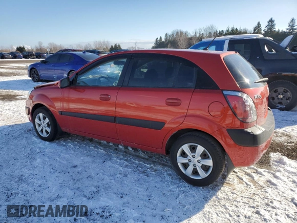 2009 Kia Rio LX with VIN KNADE243596567394, listed as a Copart auction lot 42240065 with 160,044 mi miles and Salvage Title. Bid and sale history available at carsss.com. Image 2.