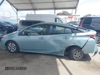 2016 Toyota Prius Four z VIN JTDKARFU8G3026830, wystawiony jako IAAI lot #41915928 z przebiegiem 64 409 mil mil oraz . Historia ofert i sprzedaży dostępna na DreamBid. Obrazek 14.