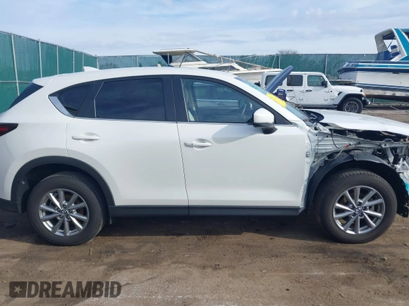 2023 Mazda CX-5 2.5 S Preferred Package with VIN JM3KFBCM9P0101587, listed as a IAAI auction lot 41878015 with 19,109 mi miles. Bid and sale history available at carsss.com. Image 14.