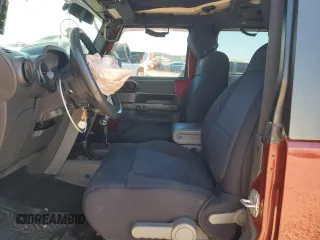 2010 Jeep Wrangler Rubicon with VIN 1J4BA6D14AL167077, listed as a Copart auction lot 54233795 with 148,638 mi miles and Salvage title. Bid and sale history available at DreamBid. Image 7.