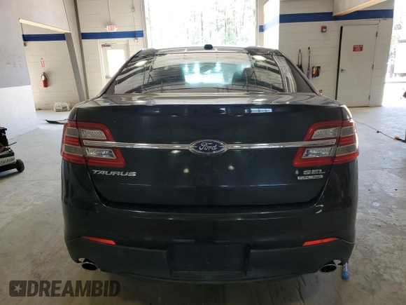2014 Ford Taurus SEL z VIN 1FAHP2E84EG112877, wystawiony jako Copart lot #52612065 z przebiegiem 103 306 mil mil oraz Szkoda całkowita • Salvage title. Historia ofert i sprzedaży dostępna na DreamBid. Obrazek 6.