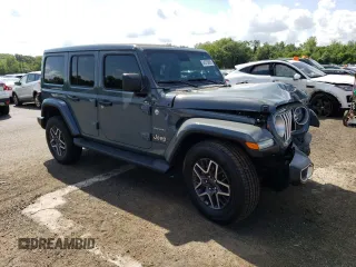 2024 Jeep Wrangler Sahara with VIN 1C4PJXEGXRW269062, listed as a Copart auction lot 64576895 with 2,159 mi miles and Salvage title. Bid and sale history available at DreamBid. Image 4.