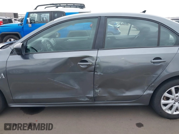 2015 Volkswagen Jetta Sedan 1.8T SE with VIN 3VWD17AJ9FM286917, listed as a IAAI auction lot 41904565 with 166,841 mi miles. Bid and sale history available at carsss.com. Image 14.