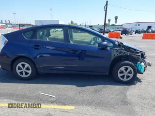 2015 Toyota Prius Four with VIN JTDKN3DU7F1954675, listed as a IAAI auction lot 42100832 with 182,339 mi miles. Bid and sale history available at carsss.com. Image 13.