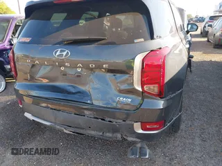 2021 Hyundai Palisade SEL z VIN KM8R24HE1MU194945, wystawiony jako IAAI lot #41987070 z przebiegiem 77 331 mil mil oraz . Historia ofert i sprzedaży dostępna na DreamBid. Obrazek 6.