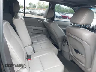 2012 Honda Pilot EX-L with VIN 5FNYF4H52CB068007, listed as a IAAI auction lot 42184390 with 137,126 mi miles and . Bid and sale history available at DreamBid. Image 8.