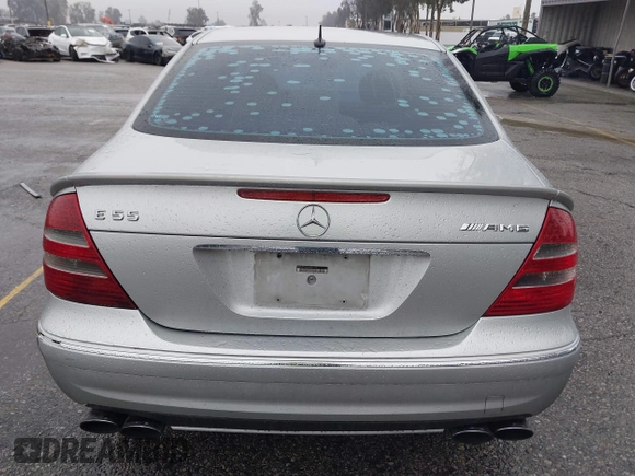 2003 Mercedes-Benz E-Class 5.5L AMG with VIN WDBUF76J93A351317, listed as a IAAI auction lot 41573446 with 144,119 mi miles. Bid and sale history available at carsss.com. Image 16.