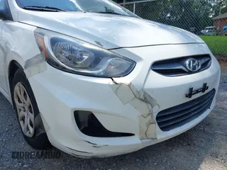 2012 Hyundai Accent GS z VIN KMHCT5AE4CU016044, wystawiony jako IAAI lot #42803906 z przebiegiem 168 824 mil mil oraz . Historia ofert i sprzedaży dostępna na DreamBid. Obrazek 14.