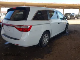 2013 Honda Odyssey LX with VIN 5FNRL5H2XDB028879, listed as a IAAI auction lot 41958988 with 49,868 mi miles and . Bid and sale history available at carsss.com. Image 4.