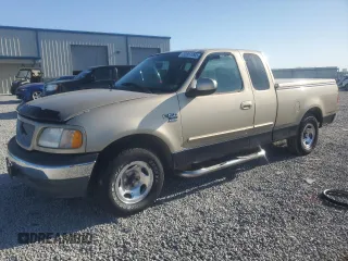 1999 Ford F-150 с VIN 1FTRX17W9XNB77873, выставлен на аукционе Copart как лот 52851065 с пробегом Не указан миль и Списание • Salvage title. История ставок и продаж доступна на DreamBid. Изображение 1.