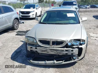 2004 Lincoln LS w/Luxury Pkg with VIN 1LNHM86S44Y626491, listed as a IAAI auction lot 41633442 with 91,469 mi miles. Bid and sale history available at carsss.com. Image 13.