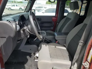 2010 Jeep Wrangler Unlimited Rubicon with VIN 1J4BA6H14AL115460, listed as a Copart auction lot 58349925 with Not provided miles and Salvage title. Bid and sale history available at DreamBid. Image 7.
