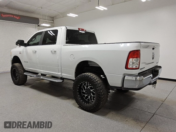 2021 Ram 2500 Big Horn z VIN 3C6UR5DL7MG542214, wystawiony jako Copart lot #52359235 z przebiegiem 119 483 mil mil oraz Tytuł czysty. Historia ofert i sprzedaży dostępna na DreamBid. Obrazek 2.