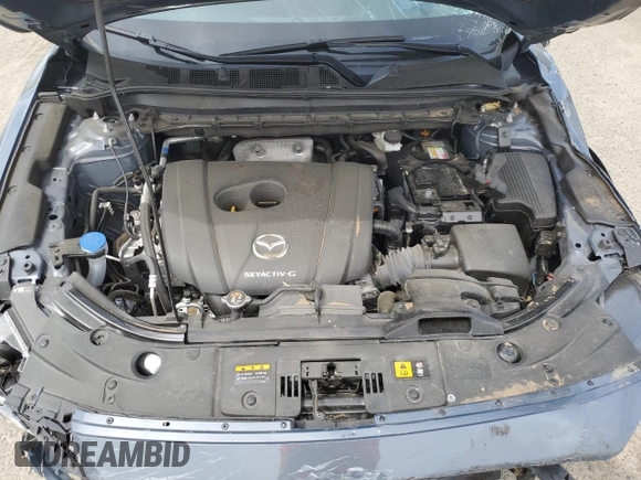 2024 Mazda CX-5 S Carbon Edition z VIN JM3KFBCL2R0521170, wystawiony jako Copart lot #53203485 z przebiegiem Nie podano mil oraz Nie do naprawy. Historia ofert i sprzedaży dostępna na DreamBid. Obrazek 12.