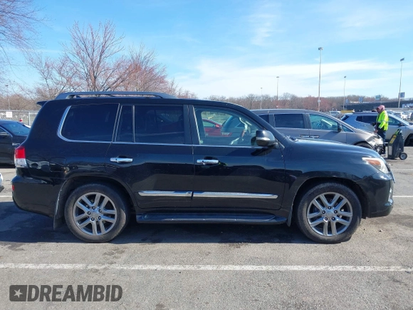 2013 Lexus LX 570 with VIN JTJHY7AX2D4099741, listed as a IAAI auction lot 41870475 with 264,966 mi miles and . Bid and sale history available at DreamBid. Image 13.