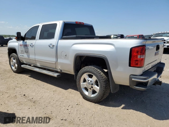 2016 GMC Sierra 2500HD SLT z VIN 1GT12TE84GF263081, wystawiony jako Copart lot #52894245 z przebiegiem 137 673 mil mil oraz Szkoda całkowita • Salvage title. Historia ofert i sprzedaży dostępna na DreamBid. Obrazek 2.