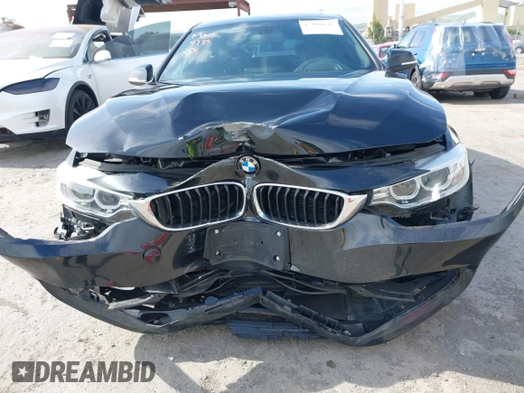 2015 BMW 4 Series 428i z VIN WBA4A9C5XFD416873, wystawiony jako IAAI lot #42108645 z przebiegiem 93 433 mil mil oraz . Historia ofert i sprzedaży dostępna na DreamBid. Obrazek 6.