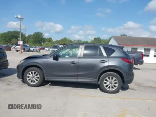 2015 Mazda CX-5 Touring with VIN JM3KE2CY9F0468199, listed as a IAAI auction lot 42099253 with 110,909 mi miles and . Bid and sale history available at carsss.com. Image 14.