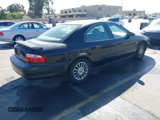2005 Mercury Sable LS z VIN 1MEHM55S95A632753, wystawiony jako IAAI lot #42865580 z przebiegiem 168 420 mil mil oraz . Historia ofert i sprzedaży dostępna na DreamBid. Obrazek 4.
