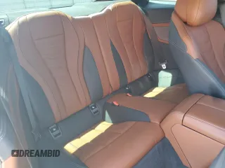 2020 BMW 8 Series M850i xDrive z VIN WBABC4C00LCE77534, wystawiony jako Copart lot #57640795 z przebiegiem Nie podano mil oraz Szkody całkowita. Historia ofert i sprzedaży dostępna na DreamBid. Obrazek 10.