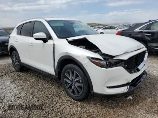 2018 Mazda CX-5 Grand Touring with VIN JM3KFBDM9J0468463, listed as a Copart auction lot 54524805 with 73,389 mi miles and Salvage Title. Bid and sale history available at DreamBid. Image 4.