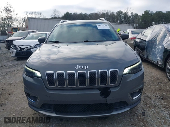 2020 Jeep Cherokee Limited with VIN 1C4PJLDBXLD502858, listed as a IAAI auction lot 41148184 with 73,509 mi miles. Bid and sale history available at carsss.com. Image 12.