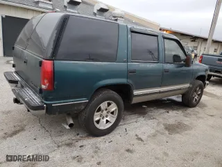 1997 Chevrolet Tahoe with VIN 1GNEK13R5VJ420751, listed as a Copart auction lot 44770025 with 236,378 mi miles and Salvage Title. Bid and sale history available at carsss.com. Image 3.