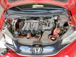 2015 Honda Fit EX-L z VIN 3HGGK5H88FM701702, wystawiony jako Copart lot #56390935 z przebiegiem 111 410 mil mil oraz Szkoda całkowita • Salvage title. Historia ofert i sprzedaży dostępna na DreamBid. Obrazek 11.