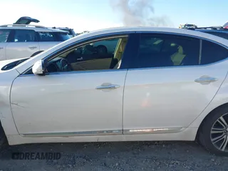 2015 Kia Cadenza Premium with VIN KNALN4D77F5170135, listed as a IAAI auction lot 41310337 with 237,376 mi miles. Bid and sale history available at carsss.com. Image 15.