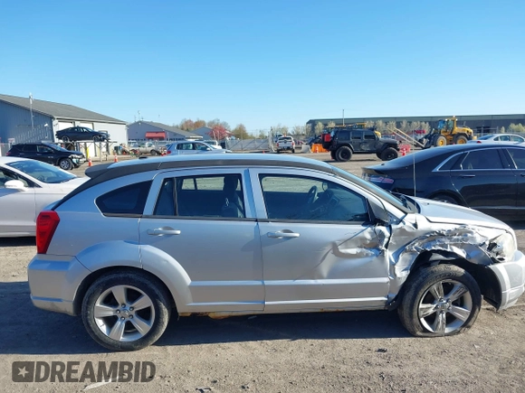 2012 Dodge Caliber SXT with VIN 1C3CDWDAXCD508338, listed as a IAAI auction lot 42091675 with 213,596 mi miles and . Bid and sale history available at DreamBid. Image 13.