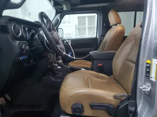 2021 Jeep Wrangler Unlimited Sahara with VIN 1C4JJXP65MW682462, listed as a Copart auction lot 58673385 with 38,714 mi miles and Salvage title. Bid and sale history available at DreamBid. Image 7.