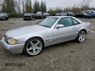2001 Mercedes-Benz SL-Class with VIN WDBFA68F01F198112, listed as a Copart auction lot 77034114 with 114,049 mi miles and Salvage Title. Bid and sale history available at carsss.com. Image 1.