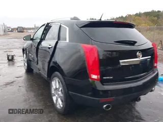 2011 Cadillac SRX Performance Collection with VIN 3GYFNBEYXBS597881, listed as a IAAI auction lot 41016643 with 164,781 mi miles and . Bid and sale history available at carsss.com. Image 3.