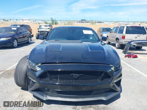 2021 Ford Mustang GT z VIN 1FA6P8CF4M5149580, wystawiony jako IAAI lot #41878355 z przebiegiem 60 028 mil mil oraz . Historia ofert i sprzedaży dostępna na DreamBid. Obrazek 12.