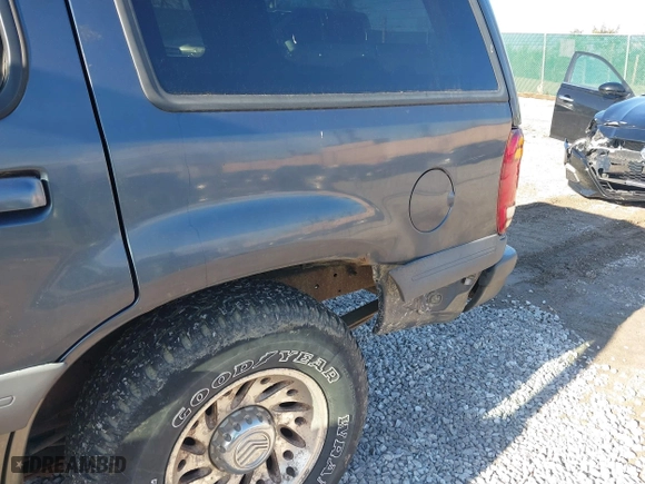 1998 Mercury Mountaineer with VIN 4M2ZU55P3WUJ17243, listed as a IAAI auction lot 41658097 with 219,464 mi miles. Bid and sale history available at carsss.com. Image 6.