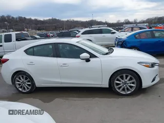 2017 Mazda 3 Touring with VIN 3MZBN1V71HM151649, listed as a IAAI auction lot 41599732 with 42,792 mi miles and . Bid and sale history available at DreamBid. Image 13.