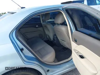 2010 Ford Fusion Hybrid with VIN 3FADP0L35AR354431, listed as a IAAI auction lot 42107722 with 142,250 mi miles. Bid and sale history available at carsss.com. Image 8.