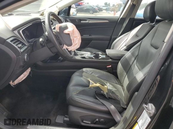 2014 Ford Fusion Titanium with VIN 3FA6P0K90ER190672, listed as a Copart auction lot 50535565 with 139,077 mi miles and Salvage Title. Bid and sale history available at DreamBid. Image 7.