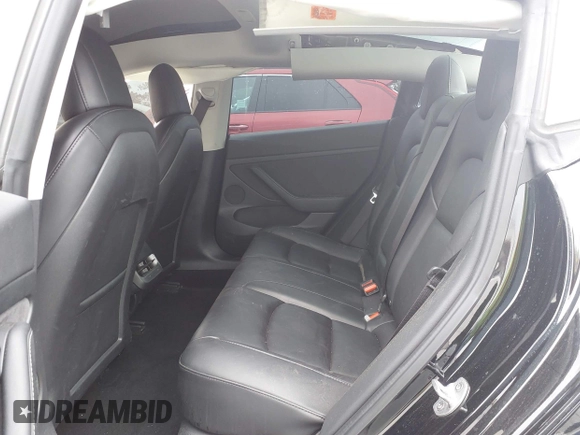 2022 Tesla Model 3 with VIN 5YJ3E1EA7NF314744, listed as a IAAI auction lot 42057596 with 30,936 mi miles and . Bid and sale history available at DreamBid. Image 8.