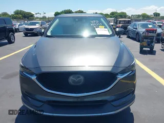 2018 Mazda CX-5 Grand Touring with VIN JM3KFADM8J1310328, listed as a IAAI auction lot 42322780 with 106,378 mi miles and . Bid and sale history available at DreamBid. Image 13.