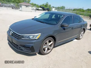 2016 Volkswagen Passat S with VIN 1VWAT7A31GC035276, listed as a IAAI auction lot 42525661 with 112,292 mi miles and . Bid and sale history available at DreamBid. Image 2.