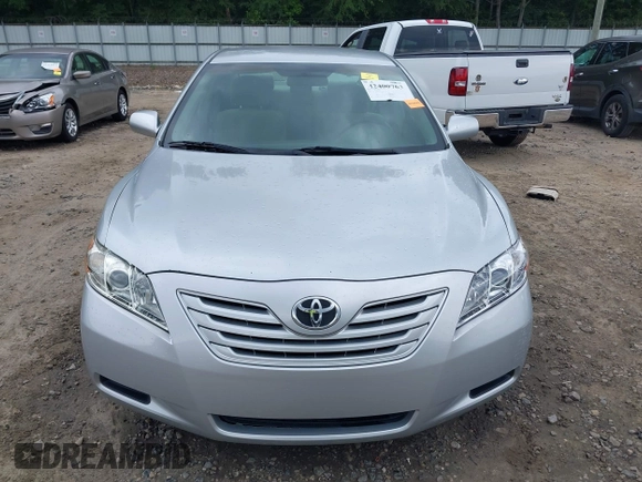2007 Toyota Camry CE z VIN 4T1BE46K67U138778, wystawiony jako IAAI lot #42400763 z przebiegiem 191 729 mil mil oraz . Historia ofert i sprzedaży dostępna na DreamBid. Obrazek 12.