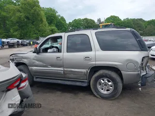 2002 GMC Yukon SLT z VIN 1GKEK13ZX2J247186, wystawiony jako IAAI lot #42095882 z przebiegiem 271 728 mil mil oraz . Historia ofert i sprzedaży dostępna na DreamBid. Obrazek 14.