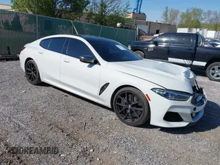 2022 BMW 8 Series M850i with VIN WBAGV8C09NCH15245, listed as a IAAI auction lot 42053154 with 26,384 mi miles and . Bid and sale history available at DreamBid. Image 1.