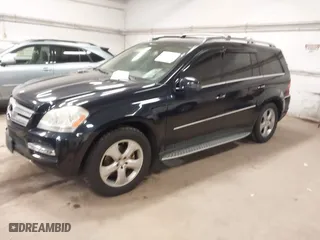 2011 Mercedes-Benz GL-Class GL 450 with VIN 4JGBF7BE4BA664500, listed as a IAAI auction lot 42099521 with 140,232 mi miles. Bid and sale history available at carsss.com. Image 2.