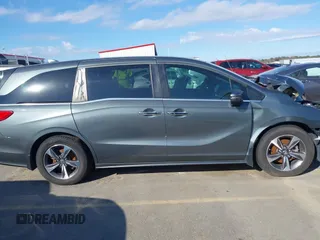 2020 Honda Odyssey Touring z VIN 5FNRL6H8XLB035047, wystawiony jako IAAI lot #41794343 z przebiegiem 57 537 mil mil oraz . Historia ofert i sprzedaży dostępna na DreamBid. Obrazek 13.