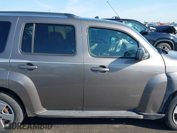 2011 Chevrolet HHR LS z VIN 3GNBAAFW9BS607895, wystawiony jako IAAI lot #42029086 z przebiegiem 98 149 mil mil oraz . Historia ofert i sprzedaży dostępna na DreamBid. Obrazek 13.